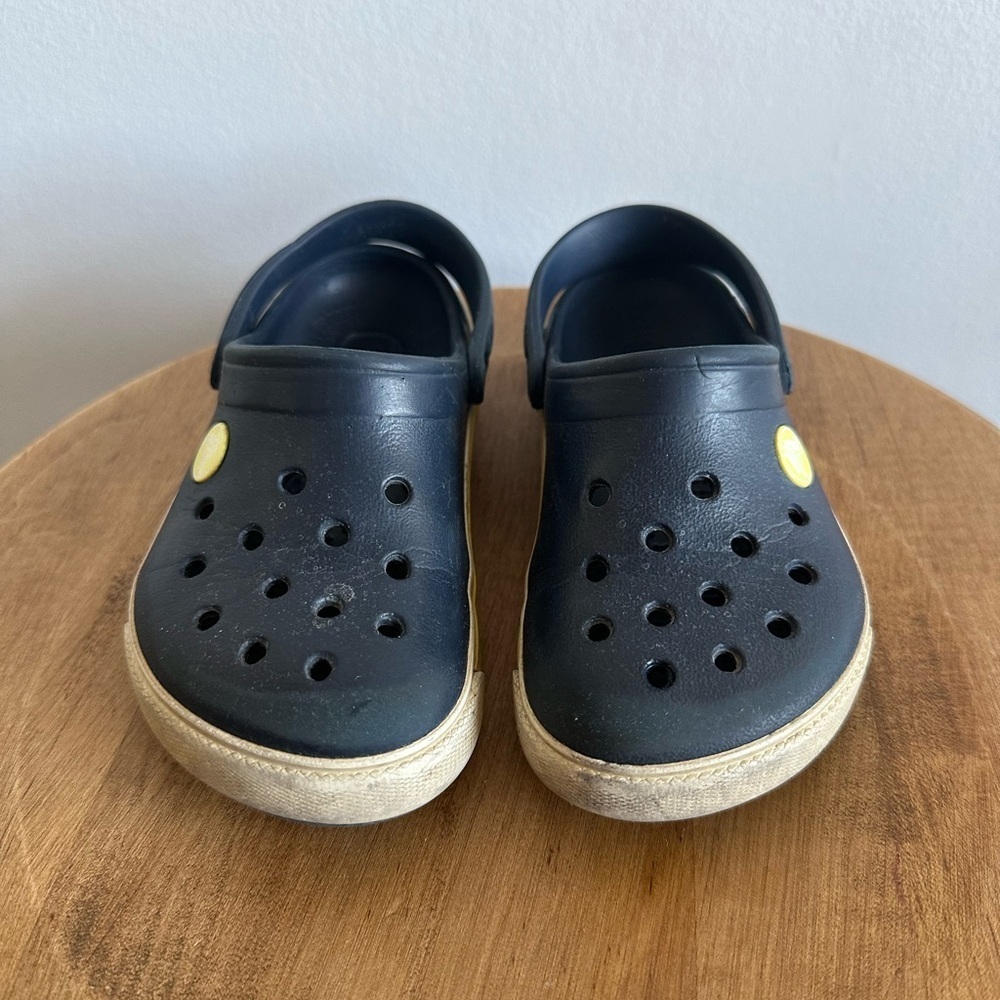 CROCS Kids Black Clogs with Yellow Accent